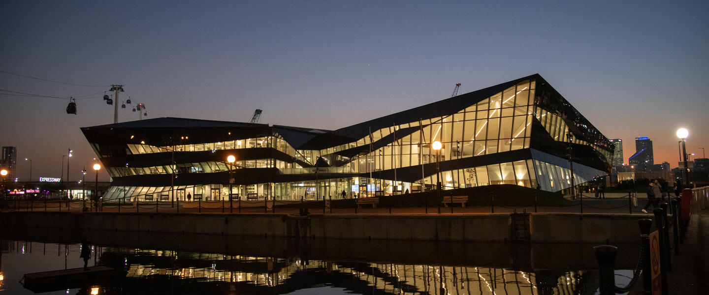 Night time image of City Hall on the docks