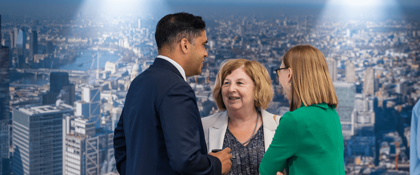 Image of Matt Carpen and Karen Buck in front of a London city scape