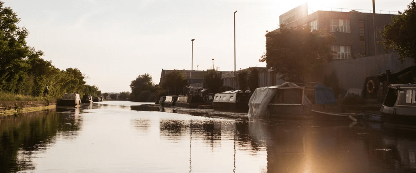 Image of a city canal at sunrise